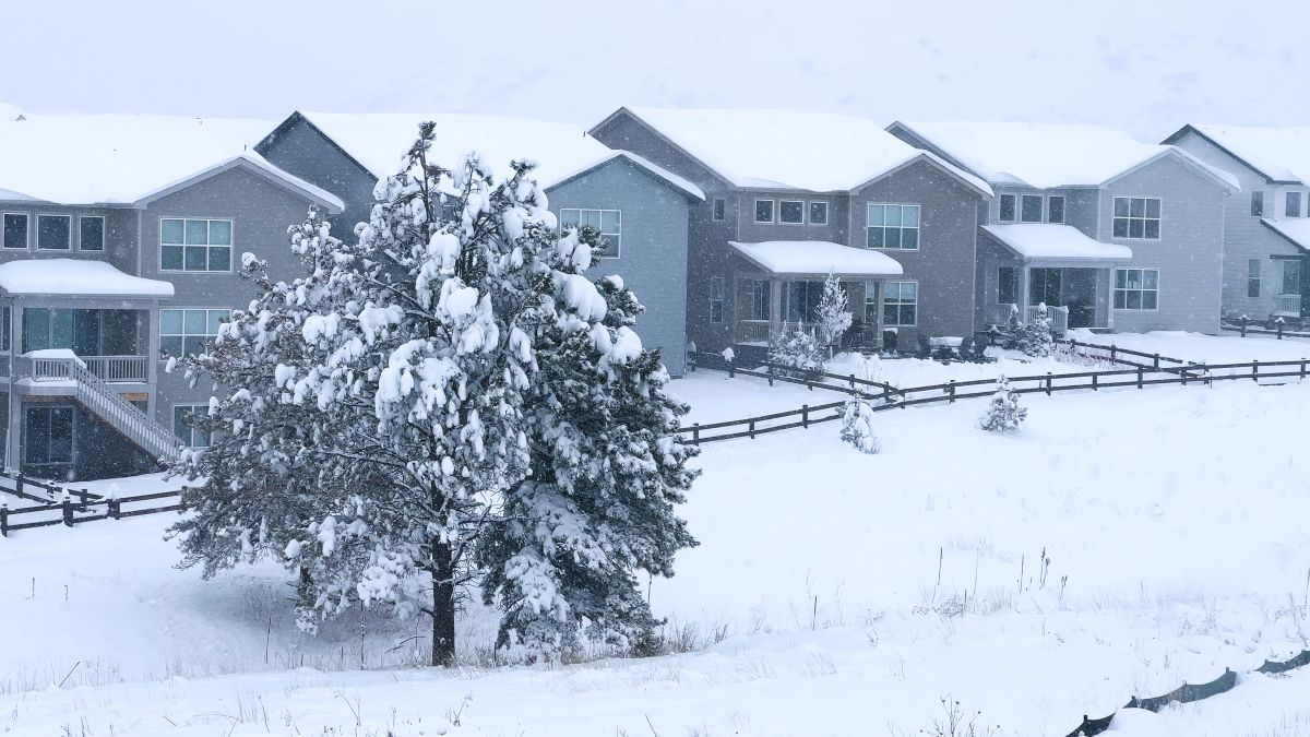 homeowner documenting property damage for insurance claim